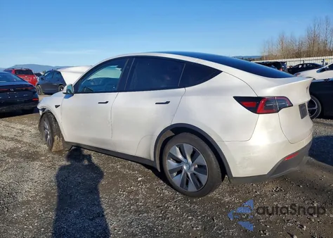 2023 Tesla Model Y из США, поврежденный, VIN 7SAYGDEEXPF802080